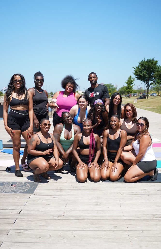 Community group photo after an outdoor wellness class